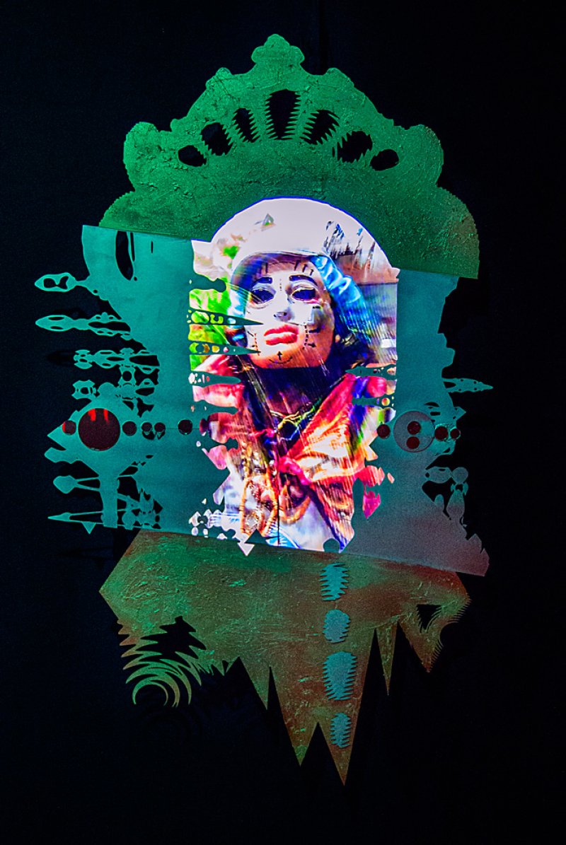 Digital collage with a central drag queen portrait, glitch art effects, and green-gold textured cutouts on a black background