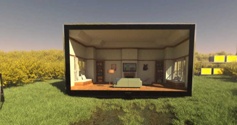 A large TV displaying a living room scene sits in a grassy field with yellow bushes under a clear sky.