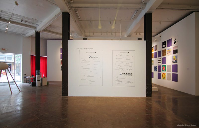 Gallery view with two large white panels featuring text, a grid of purple-framed artworks, and a red curtain.